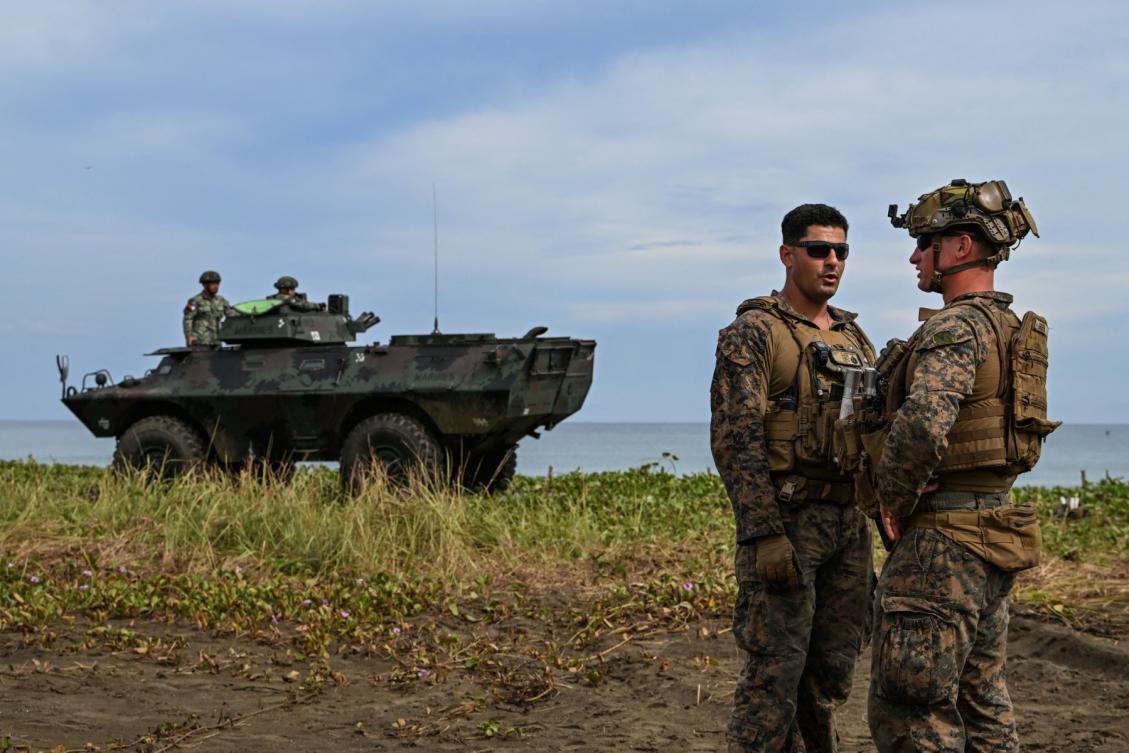 US Marines, right, they take part in a counter-landing live fire exercise during the annual US-Philippines joint military ‘Balikatan’ exercise in Rizal, Palawan on April 28, 2025. (AFP)