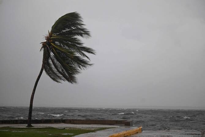 Heavy rains in northwestern Haiti kill 12 people and damage hundreds of homes