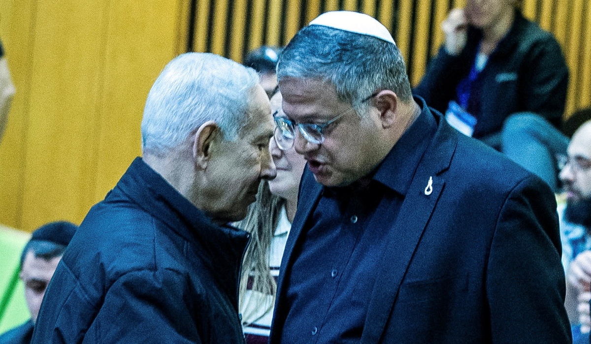 Israeli Prime Minister Benjamin Netanyahu and Israel's far-right National Security Minister Itamar Ben-Gvir shake hands as they attend a session at the Knesset, Israeli parliament, in Jerusalem March 29, 2026. (REUTERS)