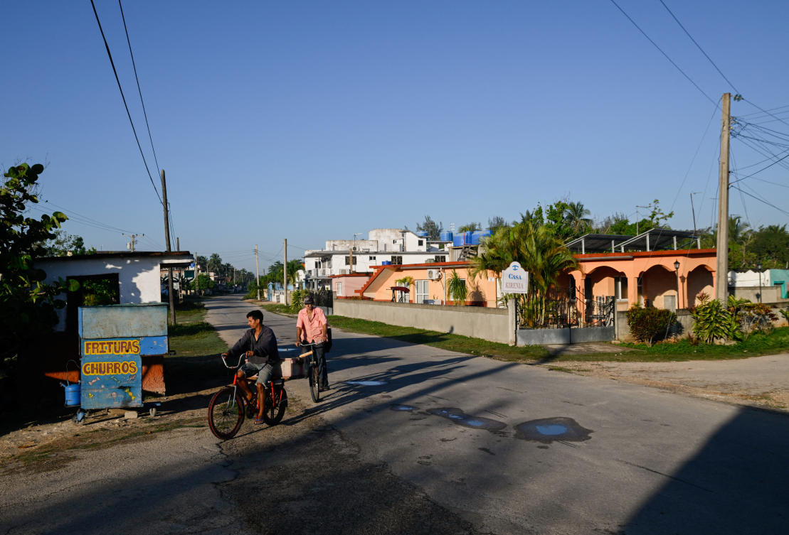 People ride their bicycles on an empty street as Cuba's top tourist destinations remain deserted amid power and fuel shortages under US sanctions, April 8, 2026. (REUTERS)