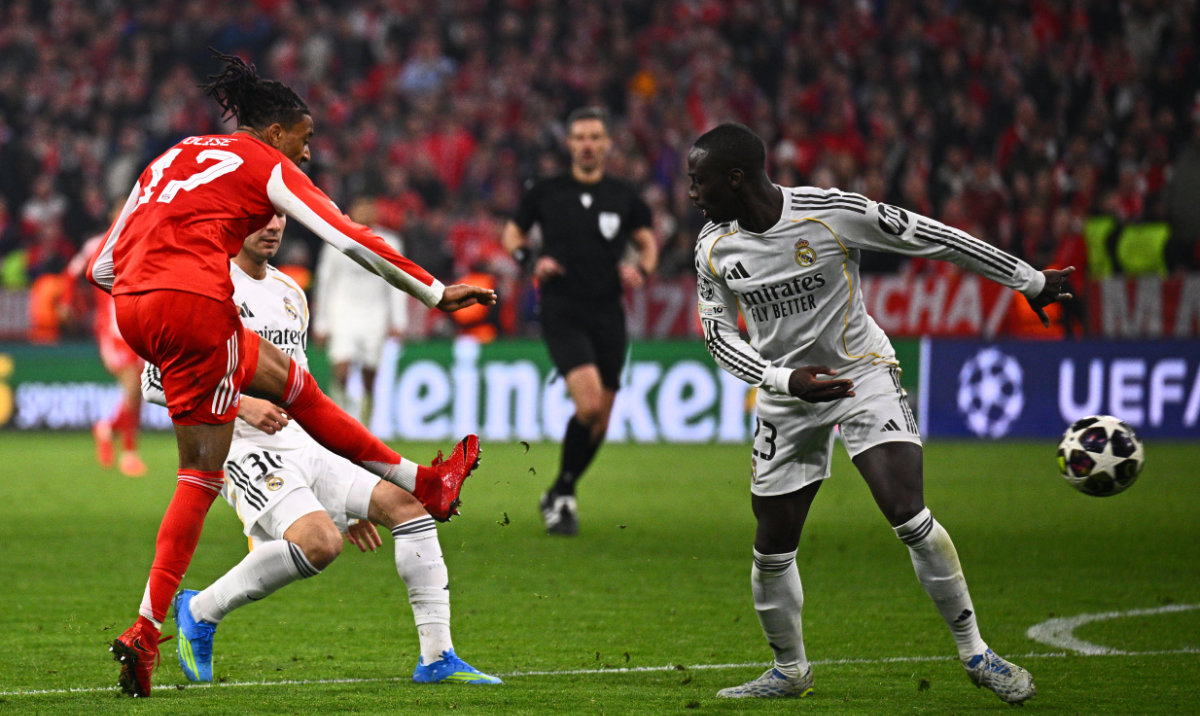 Bayern's Michael Olise, left, scores their fourth goal during the Champions League quarterfinal second leg soccer match between Bayern Munich and Real Madrid in Munich, Germany, Wednesday, April 15, 2026. (AP)