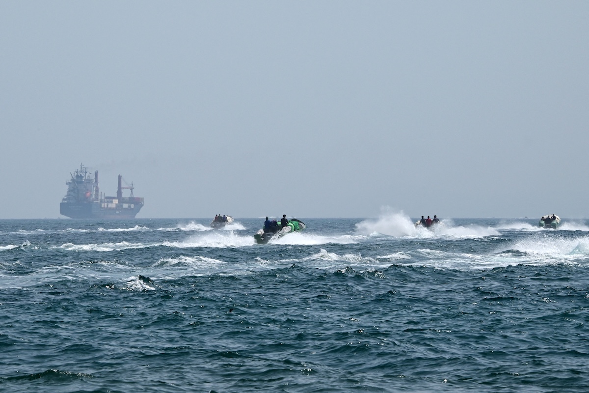 The source, who declined to be identified due to the sensitivity of the matter, said Iran could be willing to let ships use the other side of the narrow strait in Omani waters without any hindrance from Tehran. (FILE/AFP)