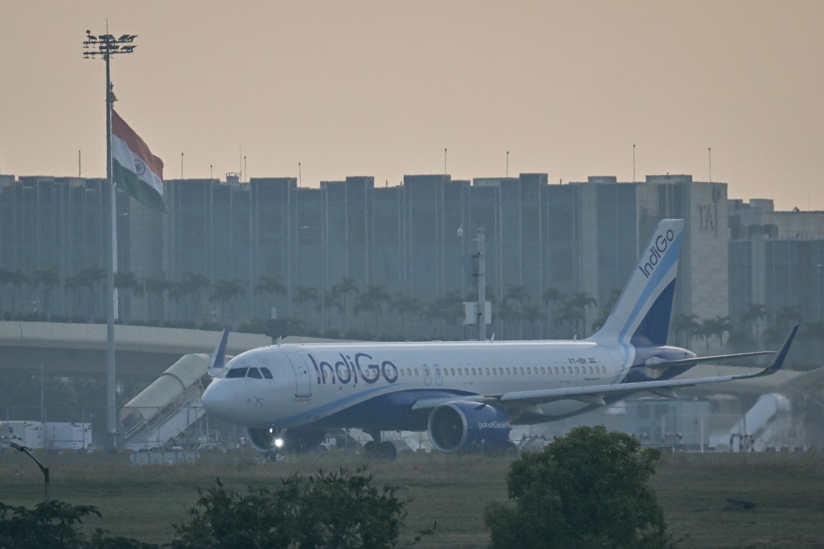An IndiGo Airlines aircraft prepares to take off at Kempegowda International Airport on a hazy day in Bengaluru on Dec. 9, 2025. (File/AFP)