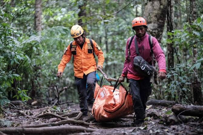 Debris found in search for missing helicopter carrying eight in Indonesia