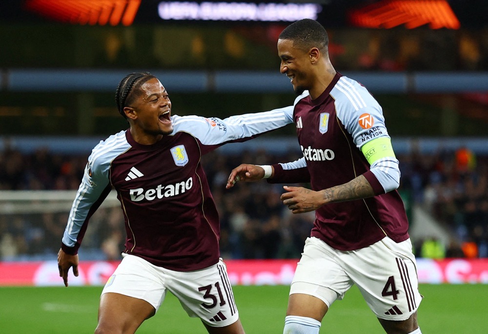 Ezri Konsa celebrates scoring with Leon Bailey. (Action Images via Reuters)
