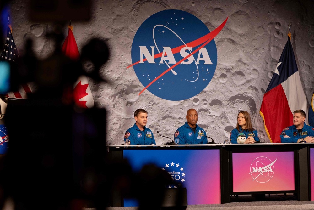 Artemis II Commander Reid Wiseman, Pilot Victor Glover, Mission Specialist Christina Koch, and Mission Specialist Jeremy Hansen speak during a press conference at the NASA Johnson Space Center on April 16, 2026 in Houston, Texas. (Getty Images/AFP)