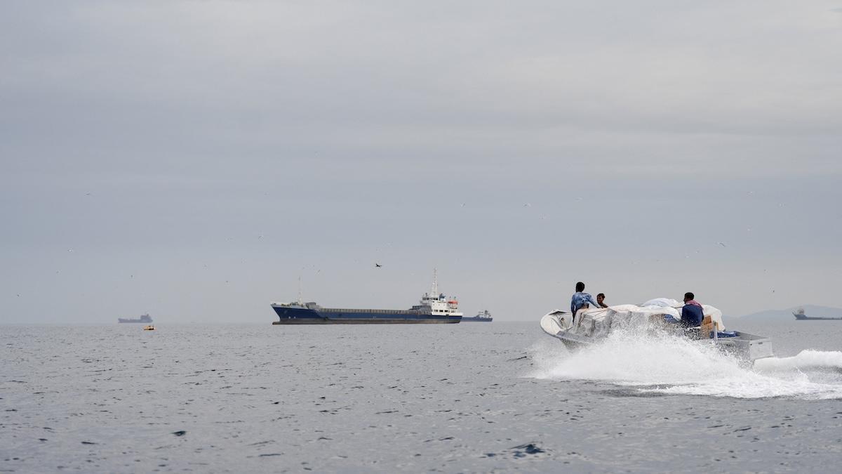Above, vessels at the Strait of Hormuz, off the coast of Oman’s Musandam province on April 12, 2026. (Reuters)