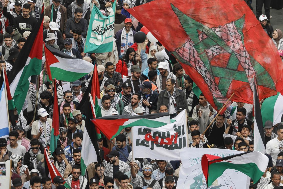 Moroccan protesters wave flags during a rally in support of the Palestinian people and against Israel's approval of a death penalty bill, in Rabat on April 19, 2026. (AFP)
