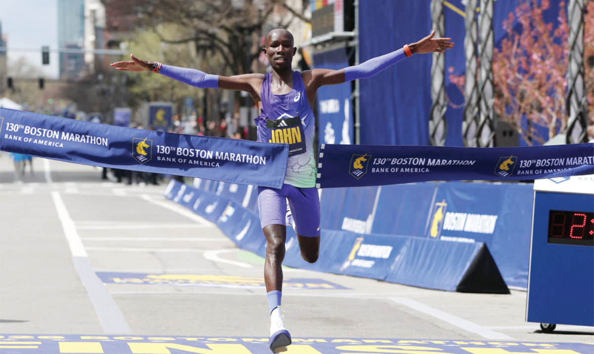John Korir of Kenya crosses the finish line to win the men’s division of the 130th Boston Marathon on Monday in Boston, Massachusetts. (AFP)