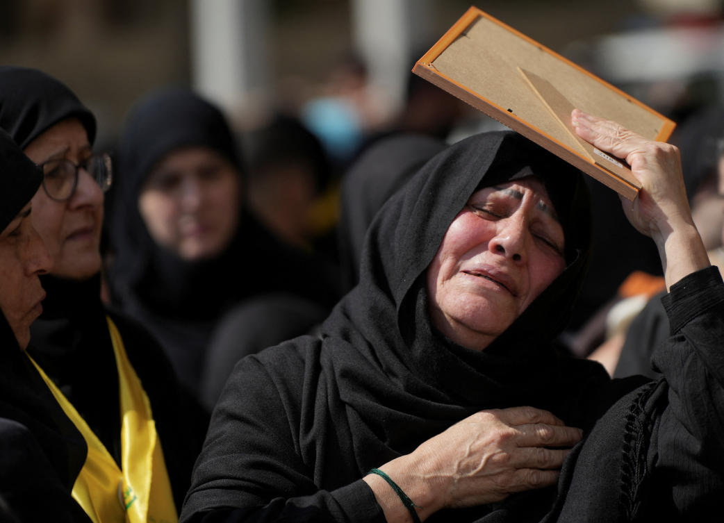 A woman mourns during the funeral of Hezbollah fighters killed during the conflict with Israel before a 10-day ceasefire between Lebanon and Israel went into effect, in the southern suburbs of Beirut, Lebanon, April 20, 2026. (REUTERS)