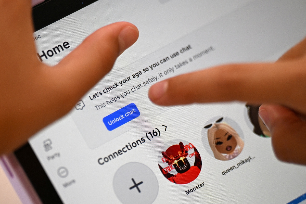 Regulatory data shows millions of suspected under-age accounts have been removed since the law came into force.. (AFP)