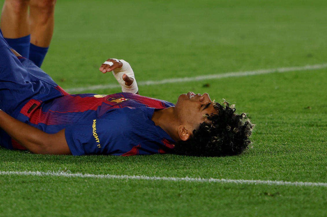 Barcelona’s Lamine Yamal lies on the pitch injured during the Spanish La Liga soccer match between Barcelona and Celta Vigo in Barcelona, Apr. 22, 2026. (AP)