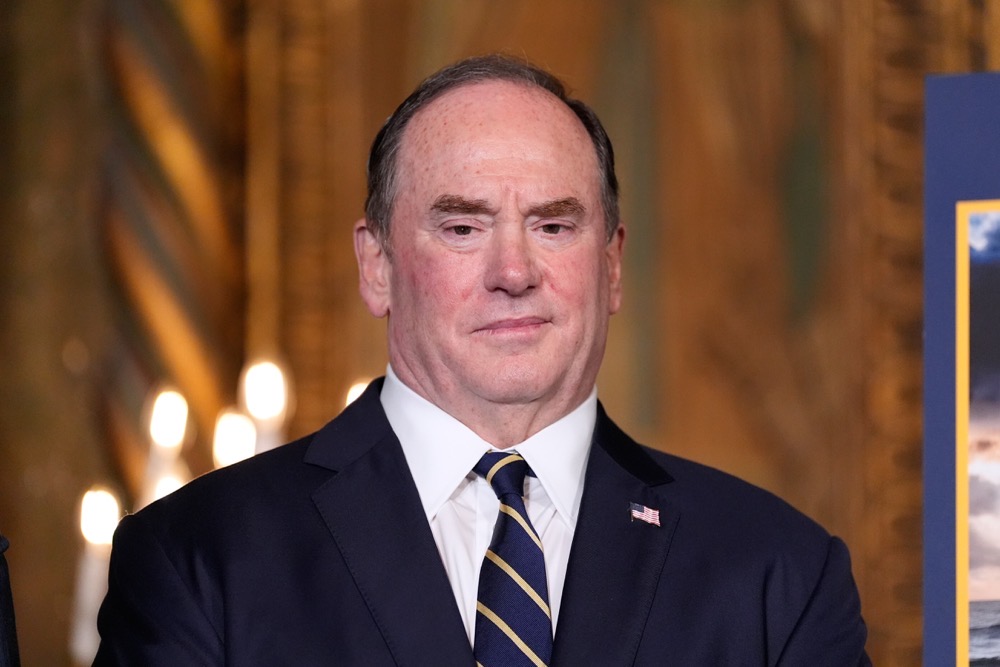 John Phelan listens. (AP/File)