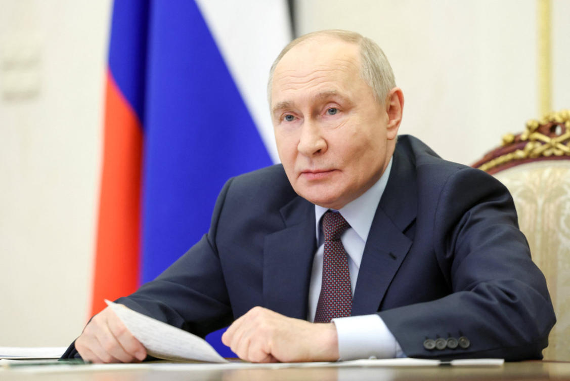 Russian President Vladimir Putin chairs a meeting with members of the government via video link at the Kremlin in Moscow on April 23, 2026. (Sputnik/Alexander Kazakov/Pool via REUTERS)