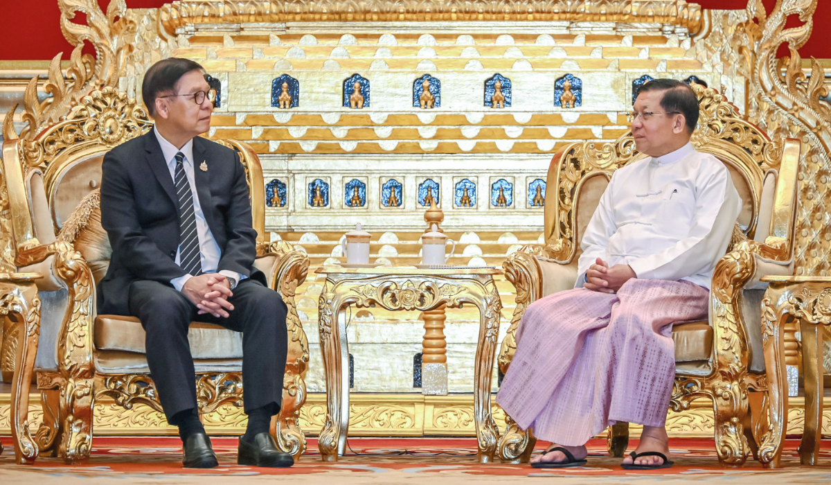 This handout picture taken by Thailand's Ministry of Foreign Affairs on April 22, 2026 and released on April 23, 2026 shows Thailand's Foreign Minister Sihasak Phuangketkeow (L) sitting with Myanmar's President Min Aung Hlaing (R) during a meeting in Naypyidaw. (AFP)