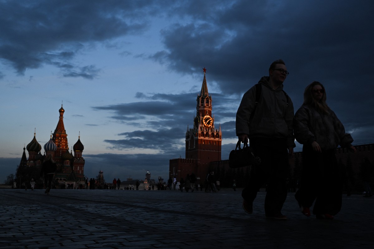 People stroll on Red Square in central Moscow, Russia. (AFP)