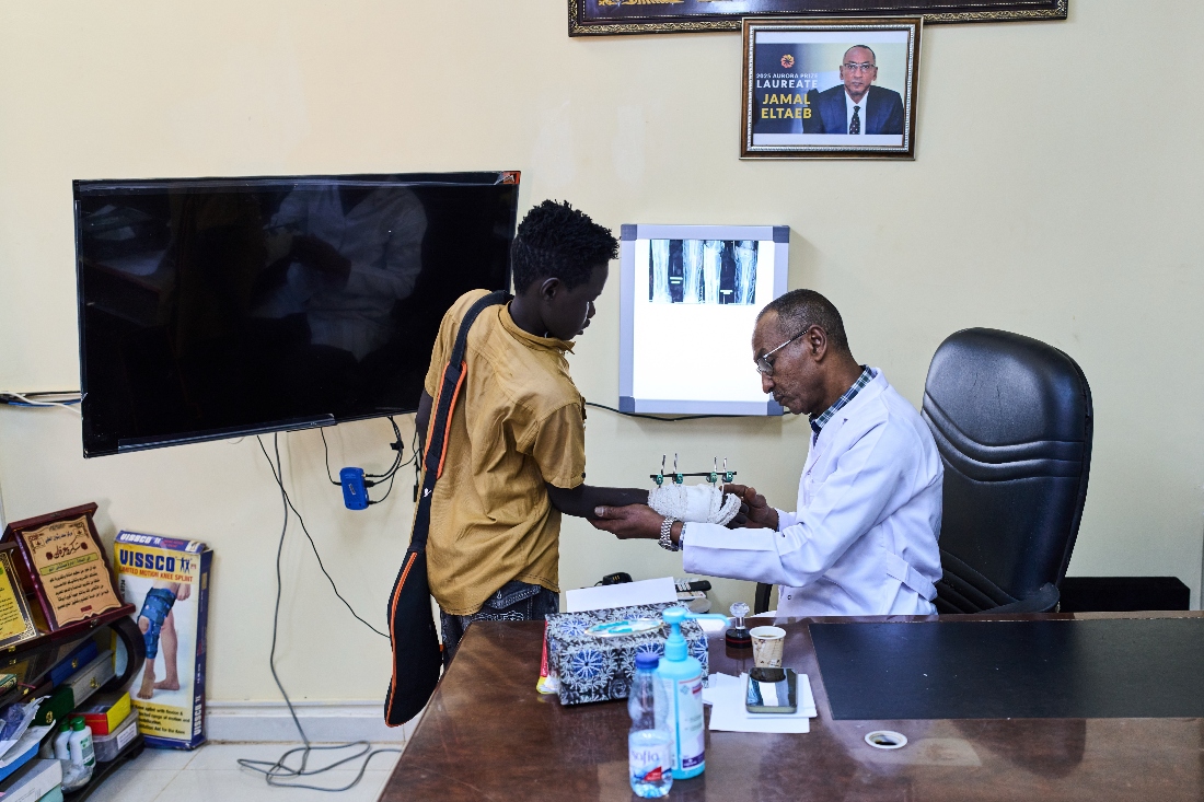 Dr. Jamal Eltaeb checks a patient at Al Nao Hospital in Omdurman, on the outskirts of Khartoum, Sudan. (AP)