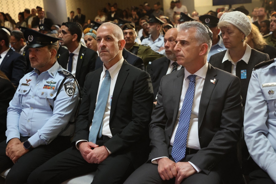 Mossad intelligence agency chief David Barnea (R) and Ronen Bar (2nd L), chief of Israel's domestic Shin Bet security agency, attend a ceremony marking Memorial Day for fallen soldiers in Jerusalem. (AFP)