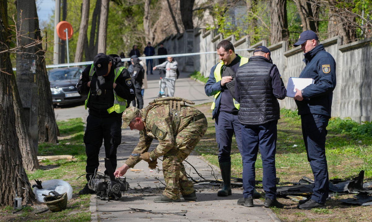 Police officers inspect fragments of a Russian drone after an air attack in Kyiv, Ukraine, Tuesday, April 28, 2026. (AP)