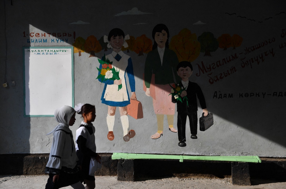 Girls go to a school on the outskirts of Batken, the regional centre of the poorest province in southern Kyrgyzstan. (AFP)