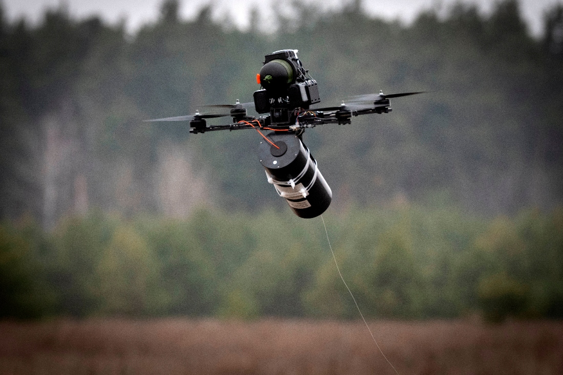 A Ukrainian made FPV fibre optic drone flies at a military market place at an undisclosed location in the Kyiv region, Ukraine. (AP)