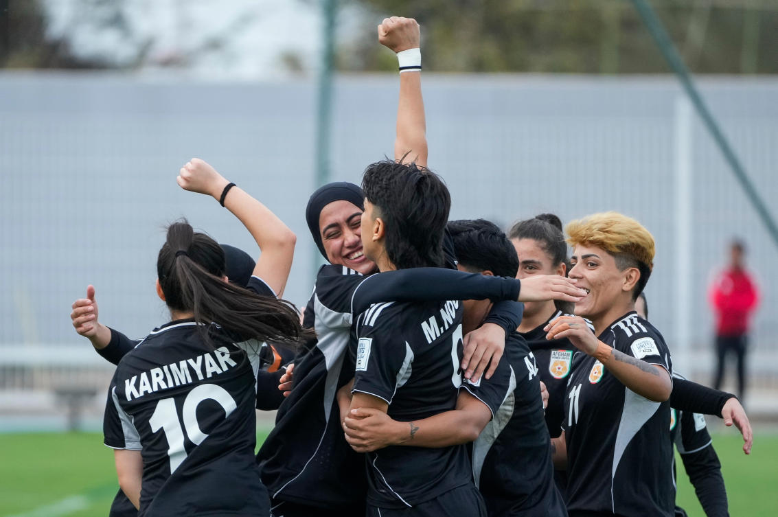 Members of Afghan Women United soccer team celebrate after scoring a goal against Chad, in their first international tournament since fleeing their country, in Casablanca, Morocco, on Oct. 26, 2025. (AP)