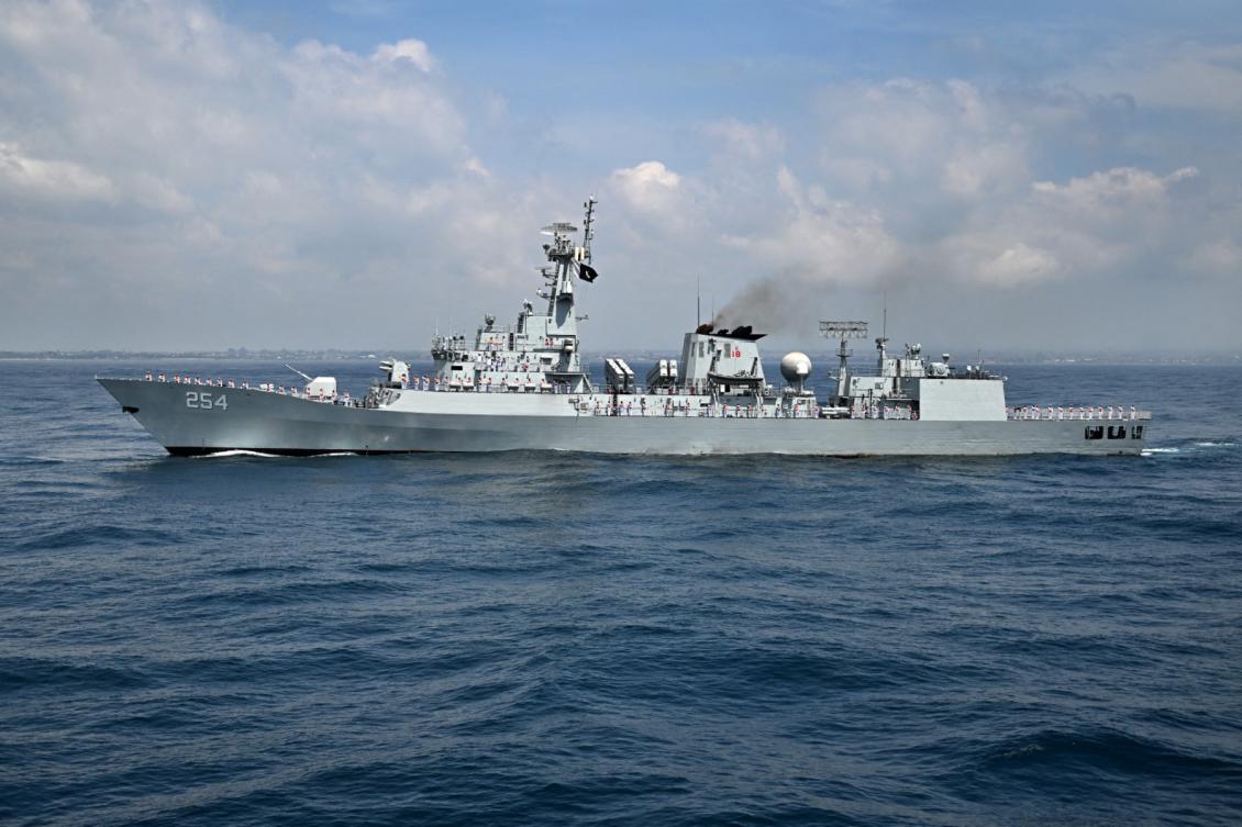 Personnel onboard the Pakistan Navy's PNS Aslat salute during the opening ceremony of the 5th Multilateral Naval Exercise Komodo 2025 off the coast of Indonesia's resort island of Bali on February 16, 2025. (File/AFP)