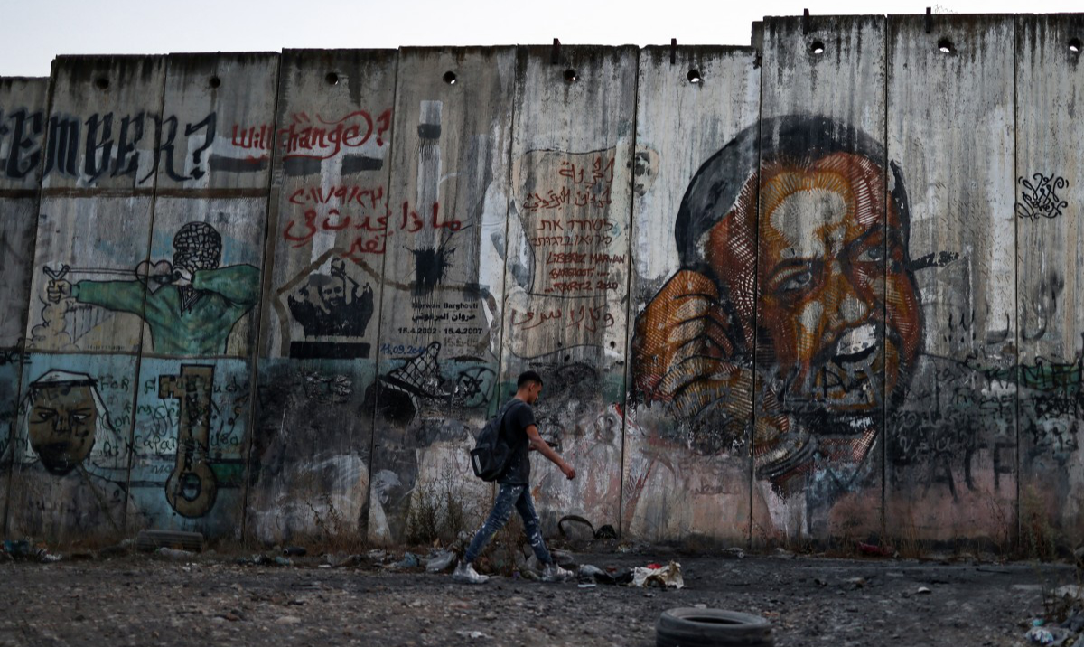 Security forces continue to hold the bodies of dozens of Palestinians killed during such raids since October 2023. (AFP)