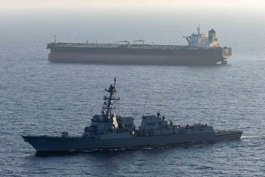 The guided-missile destroyer USS Rafael Peralta enforces the US blockade of Iranian ports against M/T Stream after it attempted to sail to an Iranian port on April 26. (X: CENTCOM)