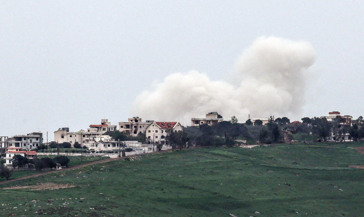 A photograph taken from the Israeli side of the border with Lebanon shows smoke billowing from southern Lebanon. (AFP)