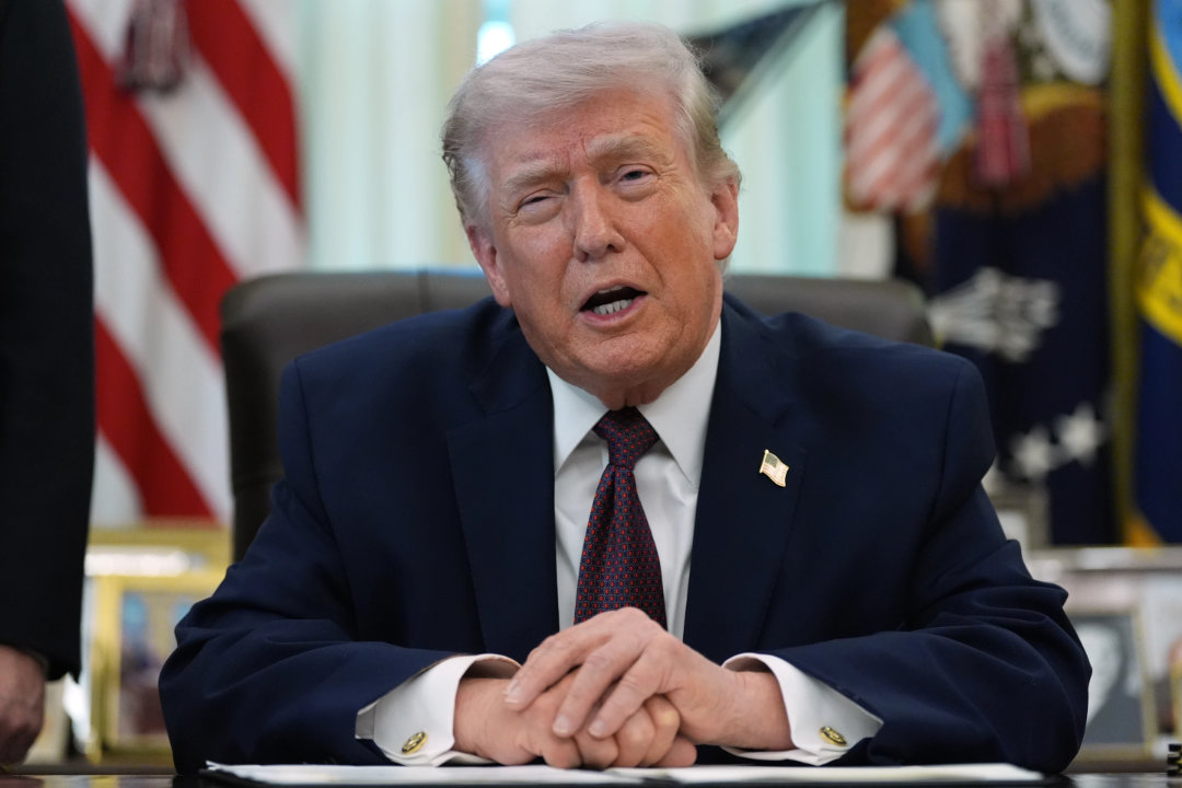 President Donald Trump speaks in the Oval Office of the White House before signing an executive order in Washington. (AP)