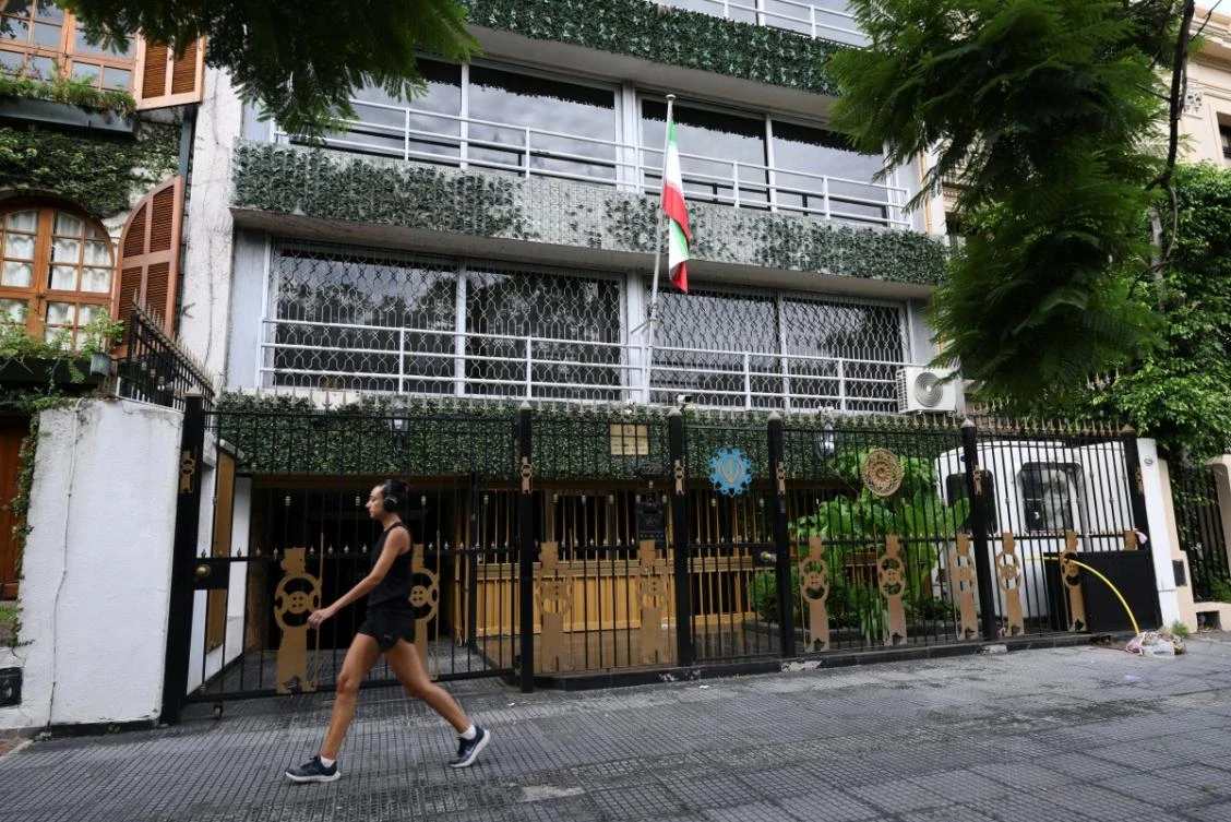 A woman walks in front of the Iranian Embassy in Buenos Aires on February 28, 2026. (File/AFP)