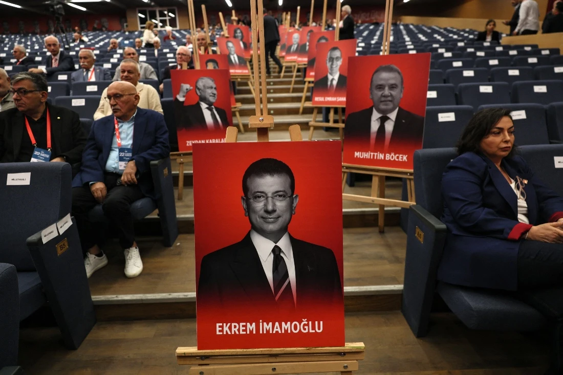 An image of jailed Istanbul Ekrem Imamoglu and other detained municipal employees are displayed during Turkiye's opposition opposition party, Republican People's Party (CHP) extraordinary congress, in Ankara, Turkiye. (AFP)