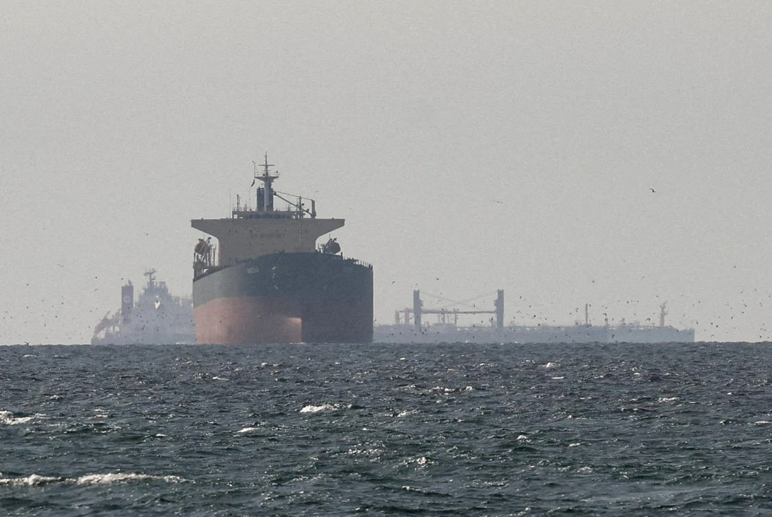 Cargo ships in the Gulf, near the Strait of Hormuz, as seen from Ras Al-Khaimah, UAE last month. (Reuters)