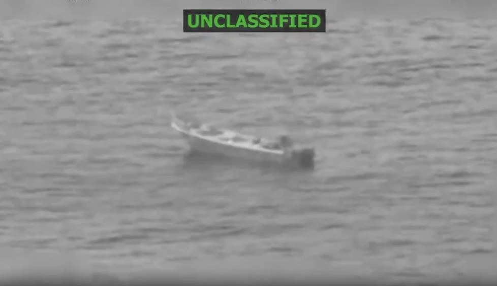 Above, a frame grab of a video released by the Southern Command shows the vessel that was struck in the Eastern Pacific. (X:@Southcom)