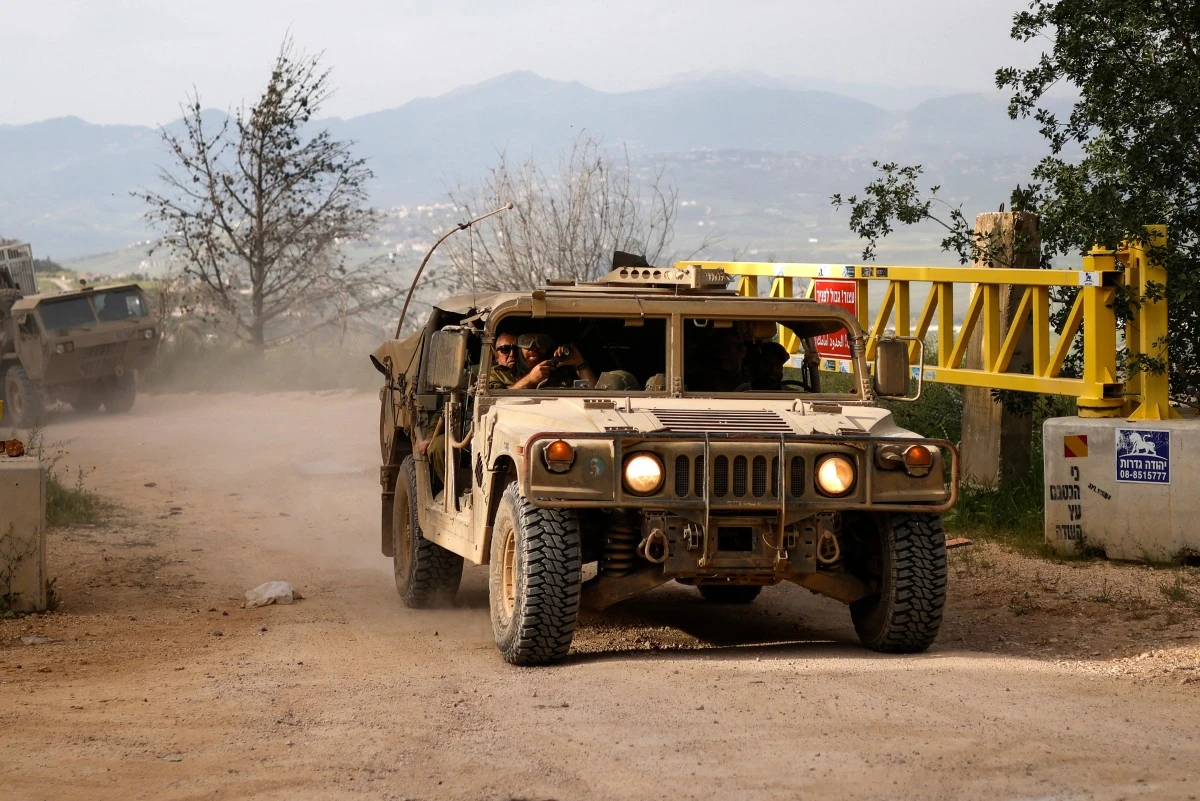 Israeli army soldiers patrol in their Humvees along the border with southern Lebanon, in the Upper Galilee of northern Israel, April 25, 2026. (Files / AFP)