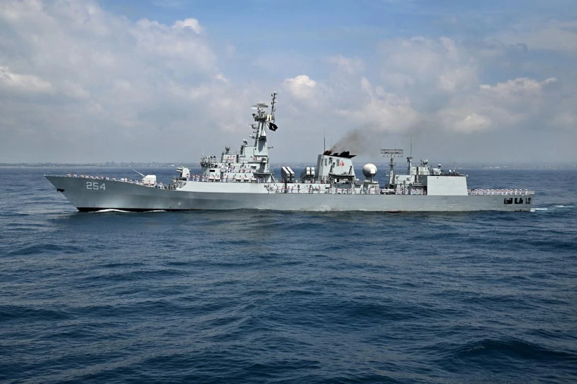 Personnel onboard the Pakistan Navy's PNS Aslat salute during the opening ceremony of the 5th Multilateral Naval Exercise Komodo 2025 off the coast of Indonesia's resort island of Bali on February 16, 2025. (File/AFP)