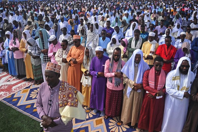 Muslim faithfuls take part in prayer at the Jamacadaha Stadium in Mogadishu on the first day of Eid Al-Adha. (AFP/File)