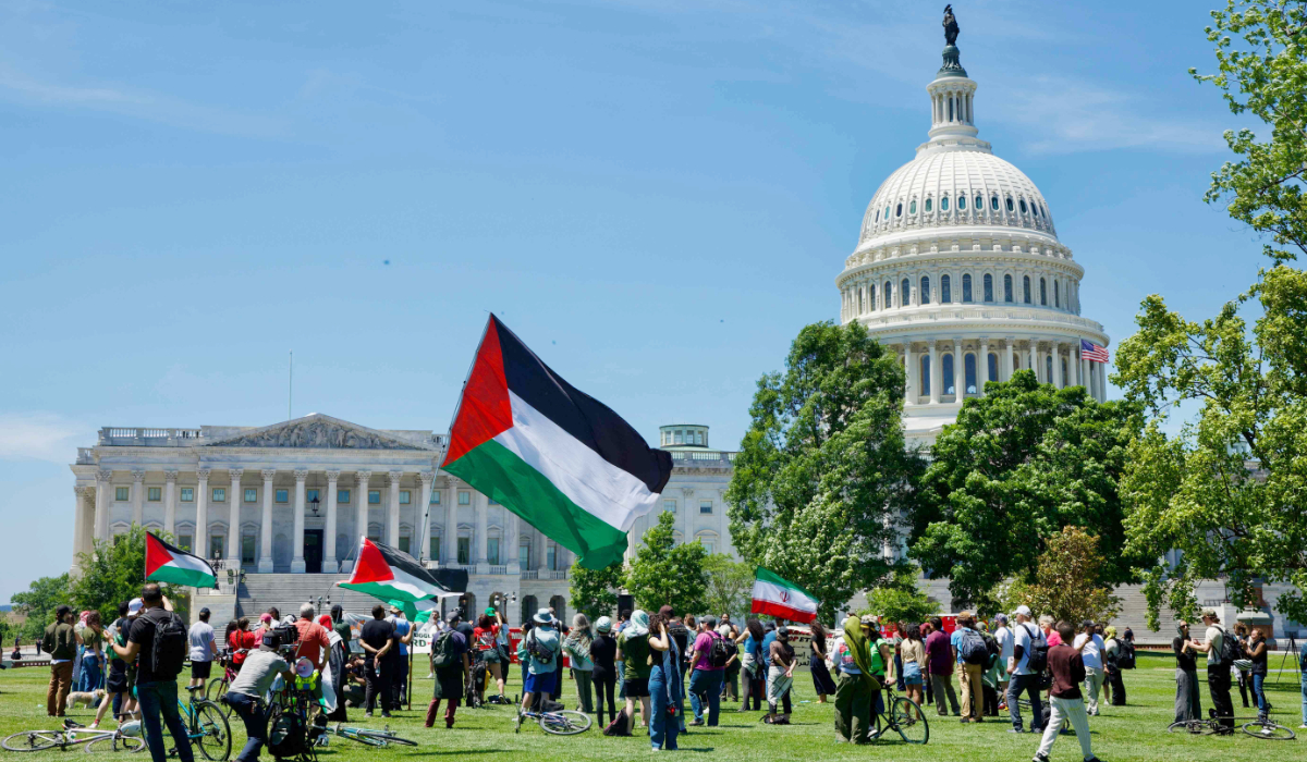 People gather near the US Capitol after participating in a Nakba solidarity bike ride in Washington, DC, on May 16, 2026. (AFP)