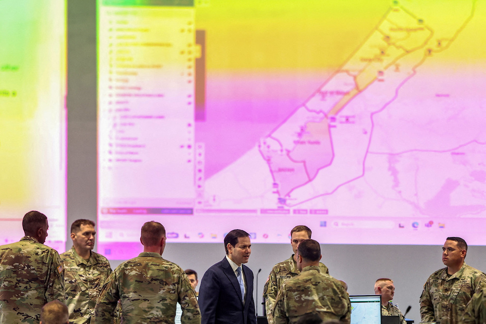 US Secretary of State Marco Rubio speaks with US military personnel as he visits the Civil-Military Coordination Center in southern Israel on October 24, 2025. (Reuters/File Photo)