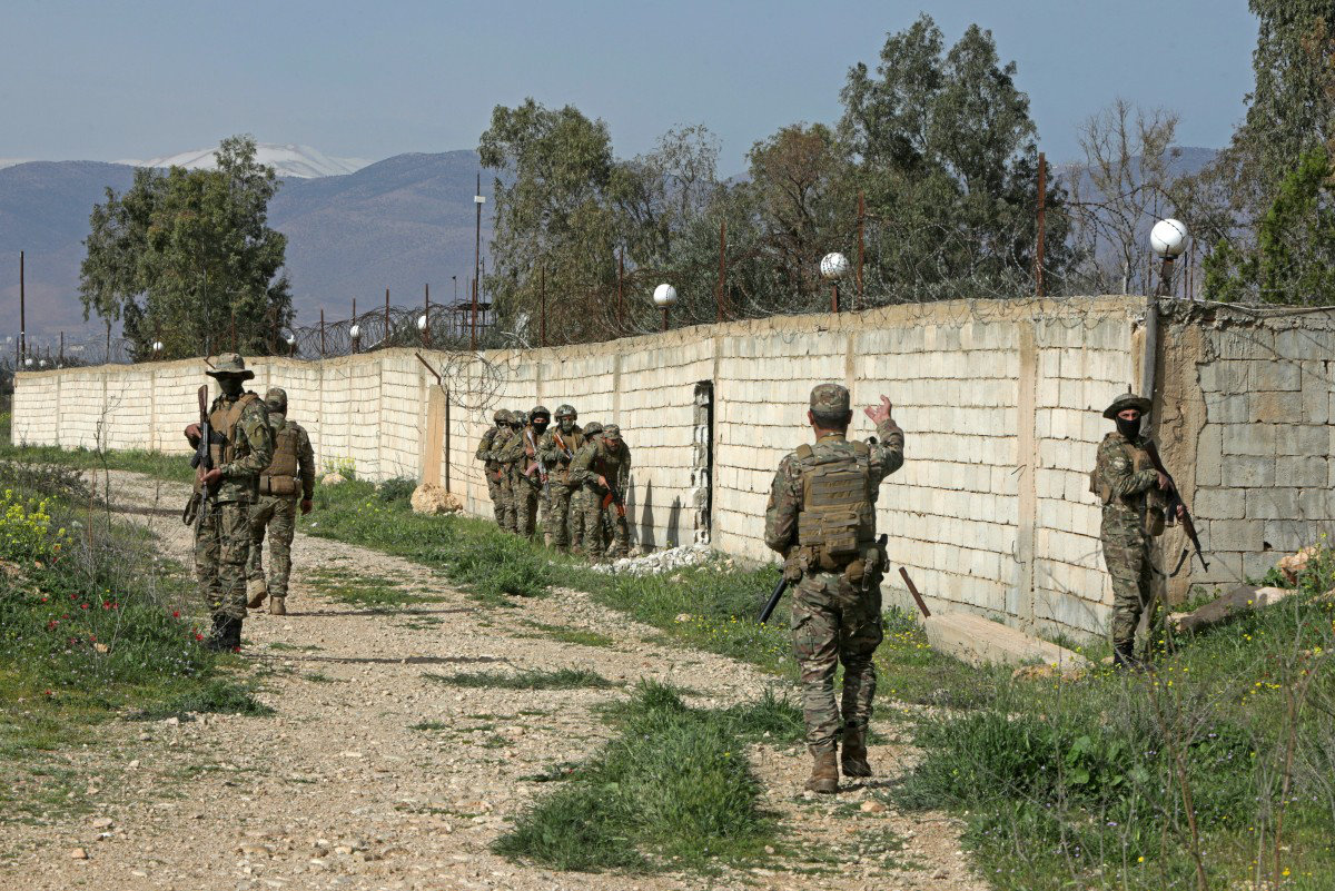 Syrian army soldiers patrol along the Syrian–Lebanese border in the rural area of Al Qusayr on April 1, 2026. Assad’s fall in late 2024 dealt a major blow to Iran. Interim authorities now seek tighter control of the borders. (AFP)