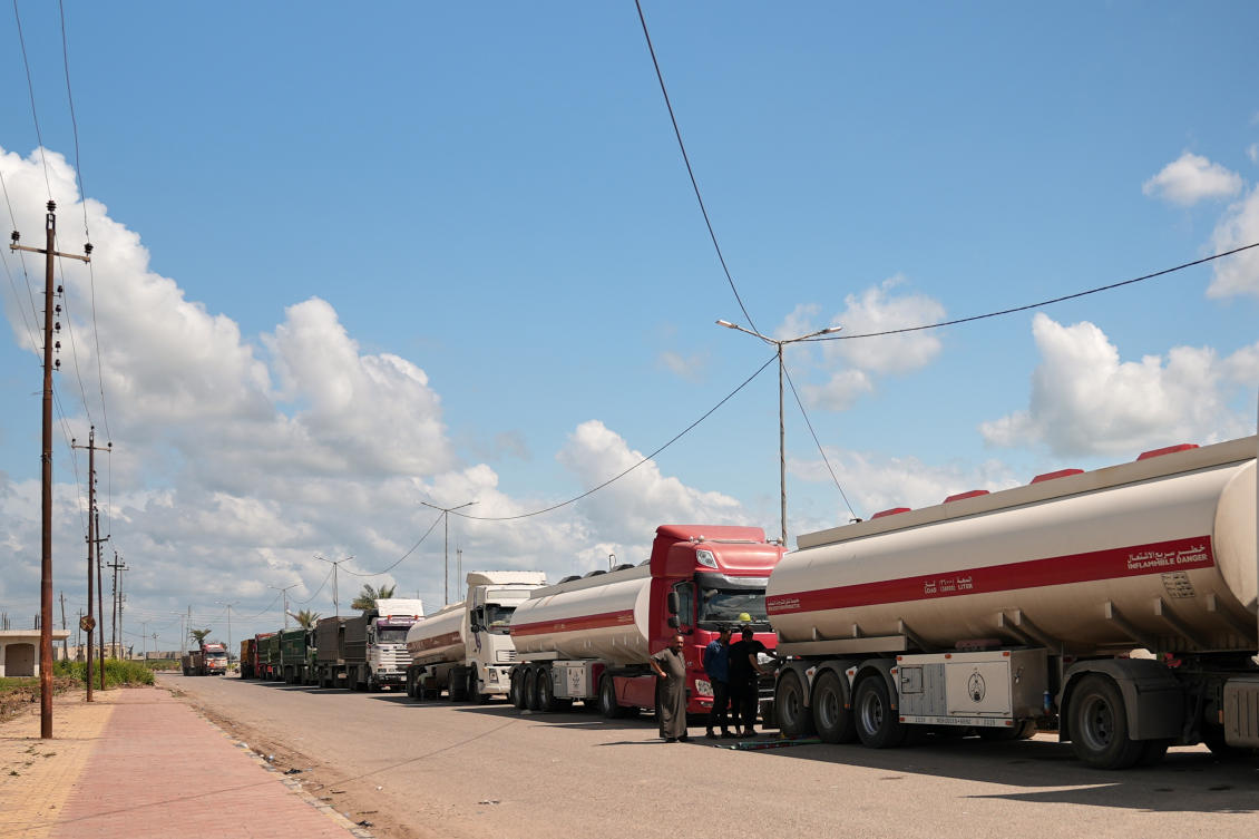 Oil tanker trucks line up to cross into Syria in Rabia, northwest Iraq, Monday, May 4, 2026. (AP)