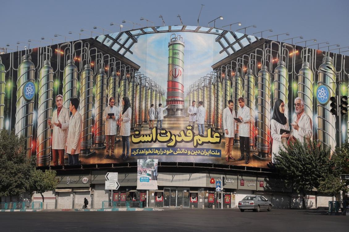 Above, a billboard with Iranian centrifuges illustrations and portraits of nuclear scientists killed in Israeli strikes on display in Tehran on Aug. 29, 2025. (WANA via Reuters)