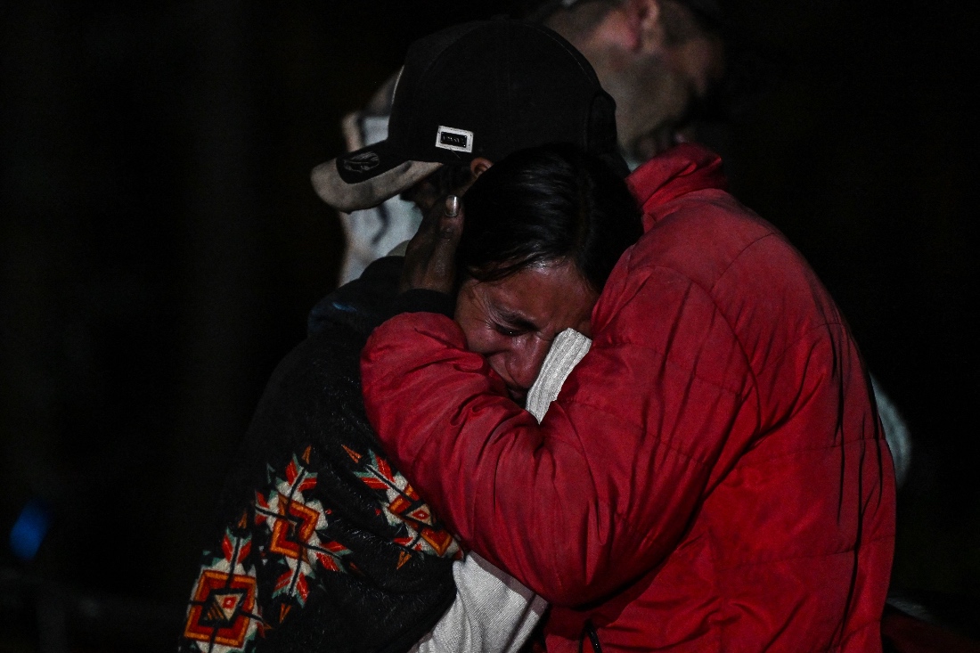 Relatives mourn the death of nine miners after an explosion at a coal mine in Sutatausa, Cundinamarca department, Colombia. (AFP)