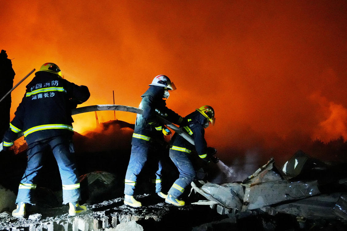 Firefighters work to extinguish a fire following a blast at a fireworks manufacturing factory in Liuyang, Hunan province, China on May 5, 2026. (cnsphoto via Reuters)
