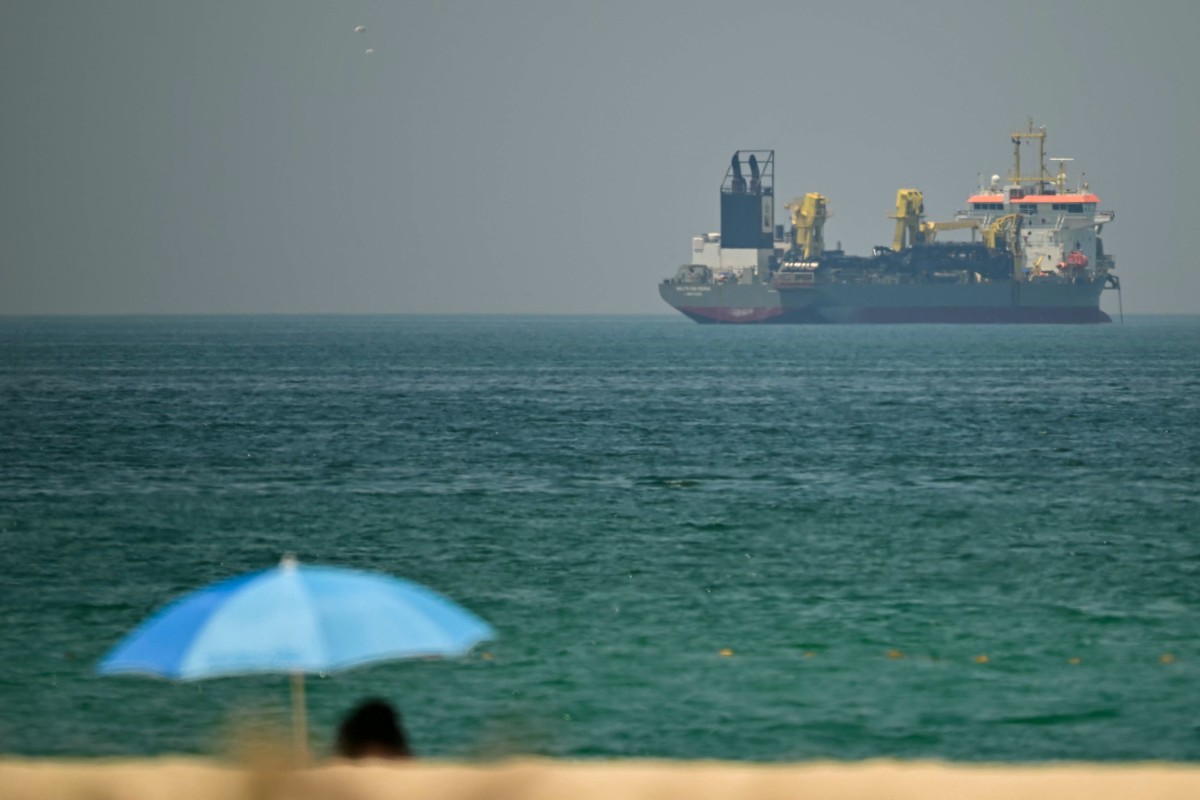 A commercial vessel is seen off the coast of Dubai, UAE, Apr. 20, 2026. (Files / AFP)