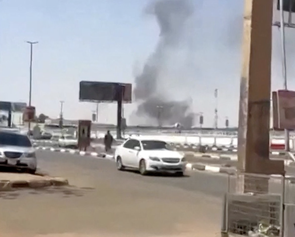 Smoke rises, following a drone attack in Khartoum airport in this screengrab taken from social media video released on May 4, 2026. (Reuters)