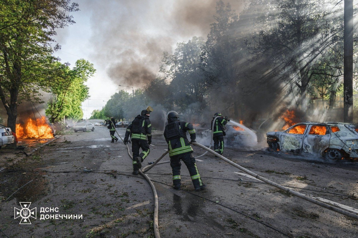 Firefighters work at a site of a Russian air strike in Kramatorsk in Donetsk region, Ukraine on Tuesday. (Handout via Reuters)