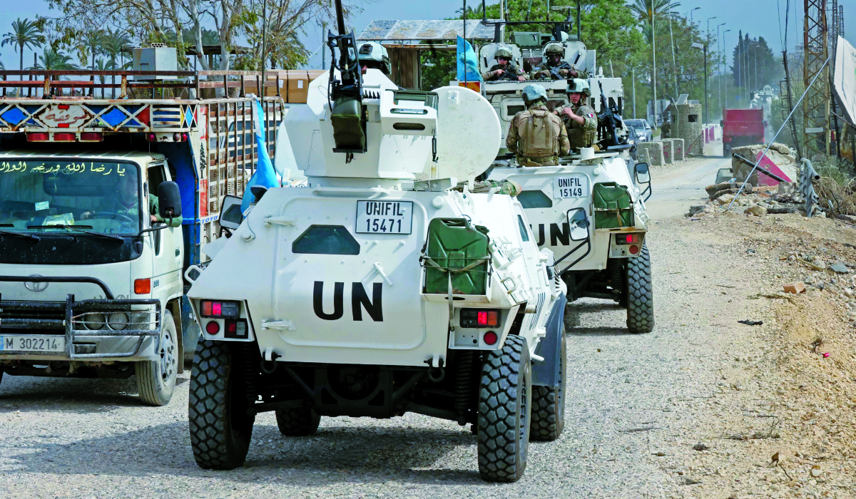 French contingent vehicles serving with the United Nations Interim Force in Lebanon (UNIFIL) cross the Qasmiyeh Bridge heading toward Sidon and Beirut, on April 19, 2026. (AFP)