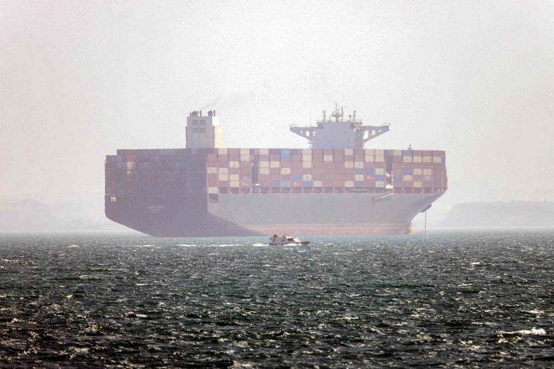 An Iran-flagged container vessel at anchor in the Strait of Hormuz off Bandar Abbas in southern Iran. (ISNA / AFP)